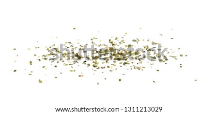 Pile of dried oregano isolated on white. Pile of dried oregano leaves on a white background. Spice for pizza. Pizza ingredient. Royalty-Free Stock Photo #1311213029