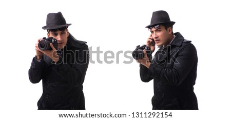 Spy with camera taking pictures isolated on white