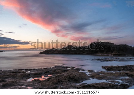Long Exposure of the Mediterranean Sea Coast in Southern Italy at Sunset