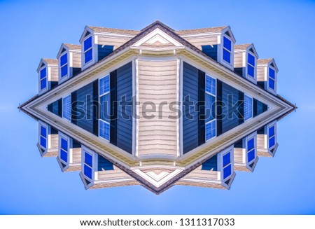 Photo of a home reflected four times vertically. Geometric kaleidoscope pattern on mirrored axis of symmetry reflection. Colorful shapes as a wallpaper for advertising background or backdrop.