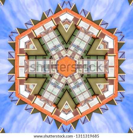 Fractal balcony design made from apartment photo. Geometric kaleidoscope pattern on mirrored axis of symmetry reflection. Colorful shapes as a wallpaper for advertising background or backdrop.