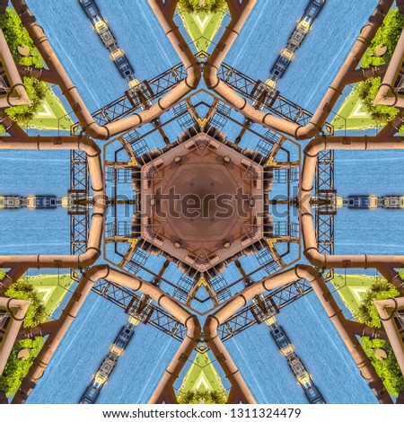 Abstract shapes of metal pipes and water. Geometric kaleidoscope pattern on mirrored axis of symmetry reflection. Colorful shapes as a wallpaper for advertising background or backdrop.