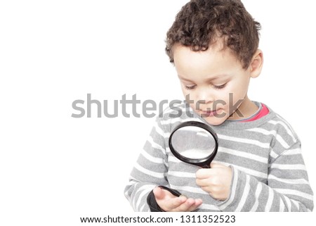 boy with magnifying glass ready to explore the world with white background and people stock image stock photo