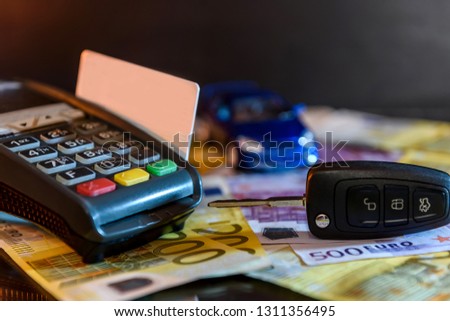 Toy car with euro and terminal with credit card
