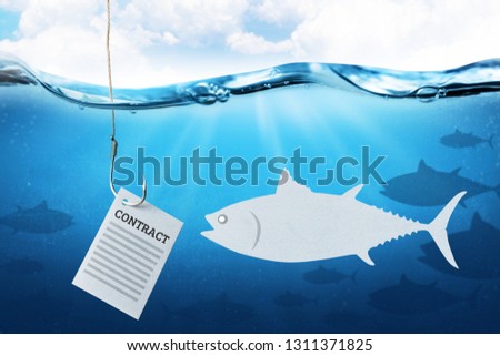 Contract as bait on a fish hook underwater with fish.