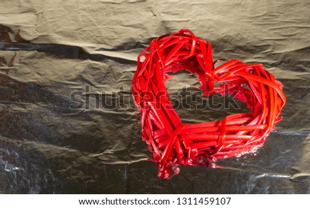 red heart on shiny background