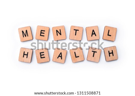 MENTAL HEALTH, spelt with wooden letter tiles.
