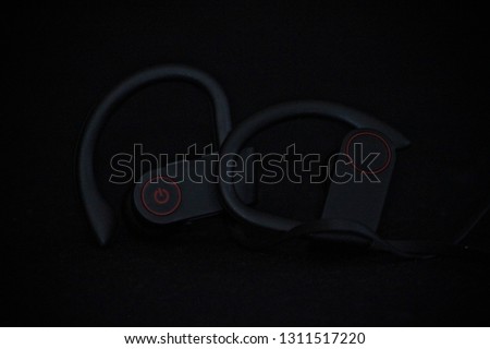 black and red sport headphones