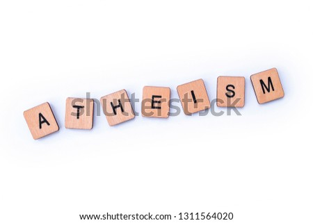 The word ATHEISM, spelt with wooden letter tiles.