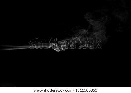 White smoke isolated on black background
