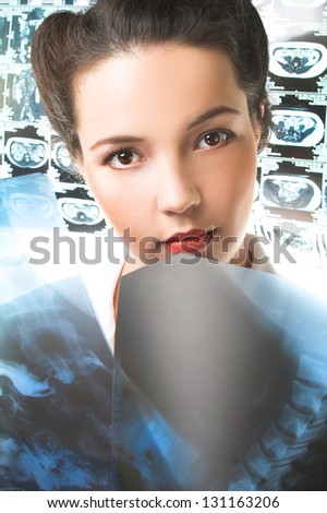 Young woman in medicine smoke and with X-ray picture