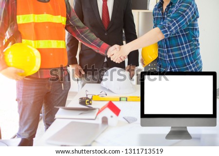 Agreement between the employer and architect Nick and desk of Architectural project in construction site or office