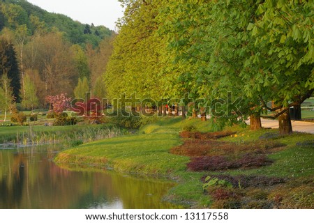 Picture of a beautiful park with a stream.