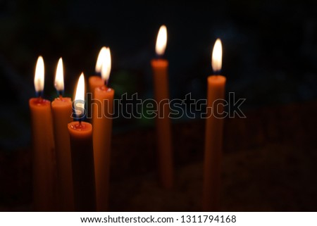 close up candles burning in the dark , Candles for pray