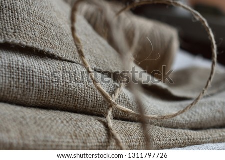 
Natural old cloth. Natural thread. Royalty-Free Stock Photo #1311797726