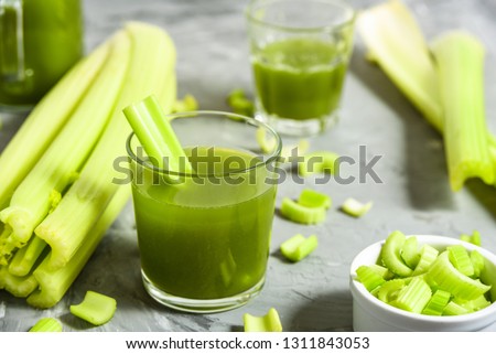 Celery Healthy Green Juice in glass Royalty-Free Stock Photo #1311843053