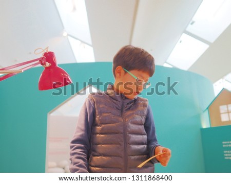 kid in his workshop, creative works