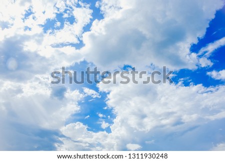 Beautiful blue sky with clouds. Anime sky clouds, anime style. Dramatic white clouds and sunlight. Anime sunrise pastel background. Sky background for animation or designer.