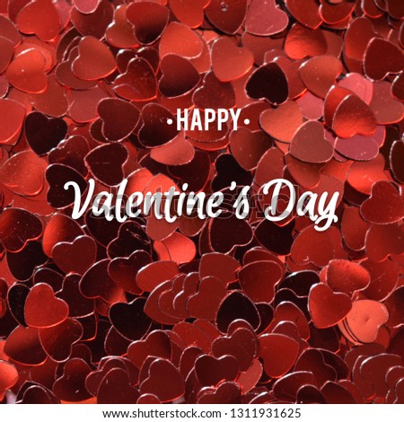 Background of many red hearts with the inscription white happy Valentine's day