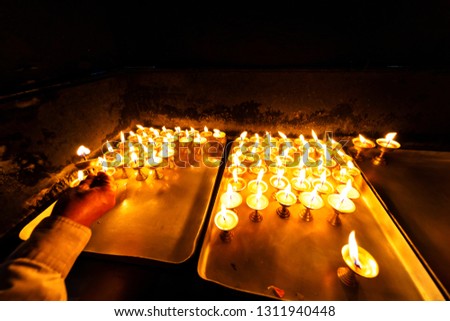 Spiritual prayer candles at temple in Kathmandu, Nepal