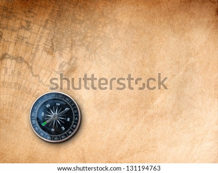 Black Compass on Brown Paper with old map Print background
