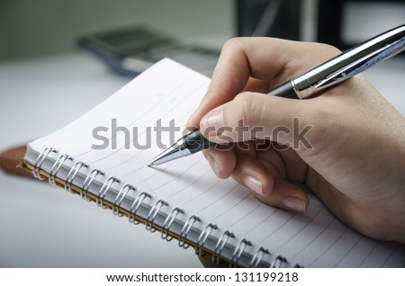 Taking note Royalty-Free Stock Photo #131199218