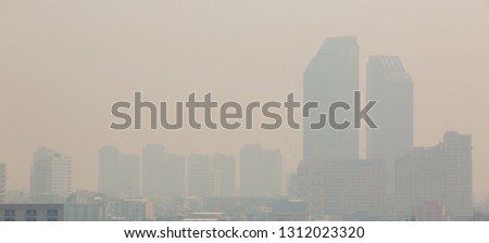 Office building under smog in Bangkok. Smog is a kind of air pollution. Bangkok City in the air pollution.