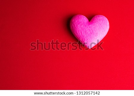 Red heart shape on red background with copy space for your text.Concept Valentine's Day, Day of love