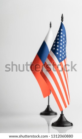 The flags of the USA and Russia on a white background isolated. The concept of policy