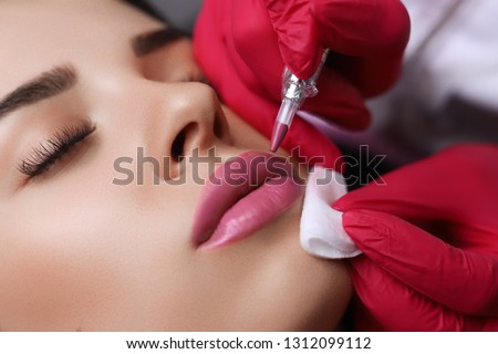 Permanent Make-up on her Lips. Royalty-Free Stock Photo #1312099112