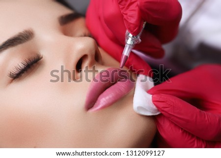Permanent Make-up on her Lips. Royalty-Free Stock Photo #1312099127