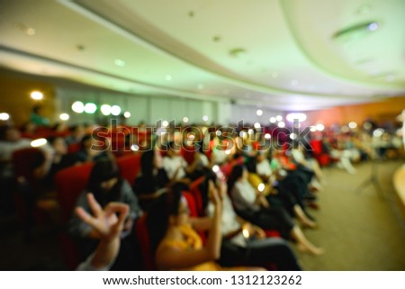 Royalty high quality free stock photo of abstract blur and defocused of audience in a conference room. They are attending a seminar or talkshow. Photo taken with wide viewing angle