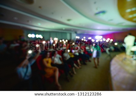 Royalty high quality free stock photo of abstract blur and defocused of audience in a conference room. They are attending a seminar or talkshow. Photo taken with wide viewing angle