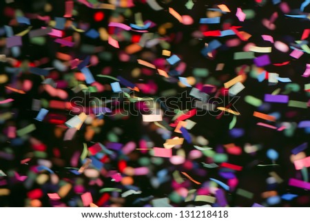Colorful streamers on black background