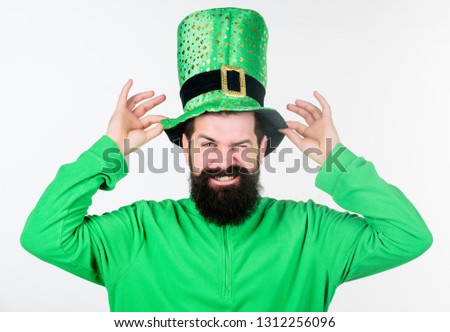 Green color part of celebration. Myth of leprechaun. Happy patricks day. Man bearded hipster wear green clothing and hat patricks day. Global celebration of irish culture. Saint patricks day holiday.