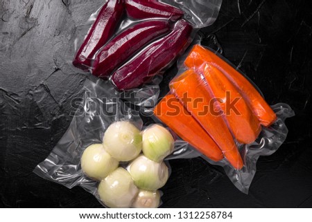 Prepack Vegetables Ingredients. Fresh raw vegetables: beets, carrots, onions, peeled, ready to cooking package blowing (bagginess) in vacuum packaged. Royalty-Free Stock Photo #1312258784