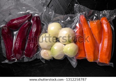 Prepack Vegetables Ingredients. Fresh raw vegetables: beets, carrots, onions, peeled, ready to cooking package blowing (bagginess) in vacuum packaged. Royalty-Free Stock Photo #1312258787