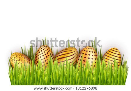 Border from decorated Easter golden eggs in fresh green grass isolated on white background. Greeting card, banner or poster template design