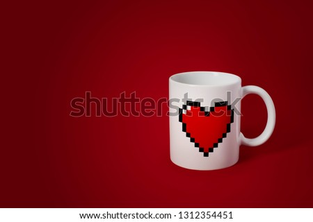 White mug with red 8-bit heart on red background