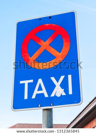 no parking taxi stand sign
