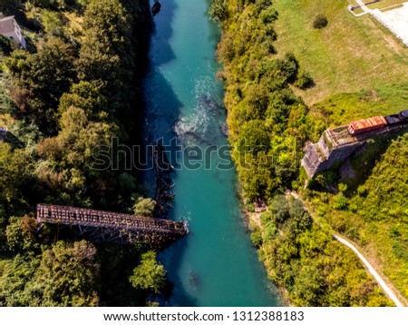 Drone view to the destroyed railway bridge in river Neretva during the war 
