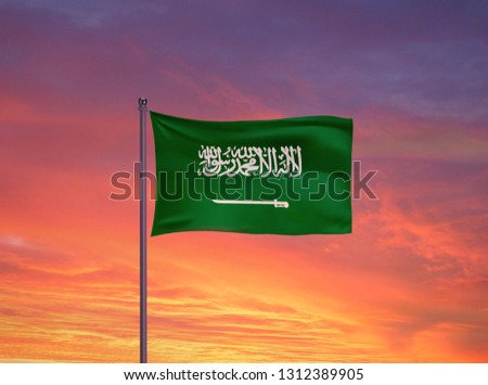 Saudi Arabia Flag on Sunset Sky