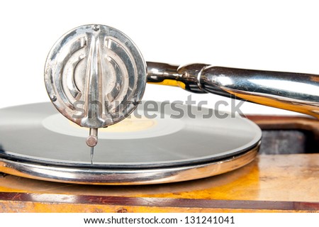 old gramophone needle and a black vinyl