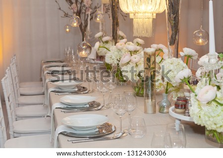 Table set for an event party or wedding reception, luxury elegant table setting dinner