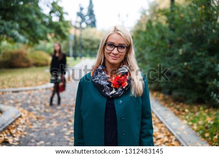 Two girls autumn photo.
