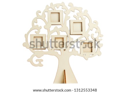 Wooden frame of the family tree on a white background. Small frames on the tree for the whole family.