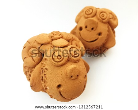 Cute sheep clay doll on white background