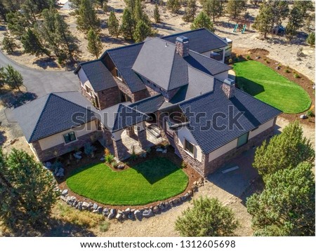Aerial drone photo of beautiful home in Central Oregon. Royalty-Free Stock Photo #1312605698
