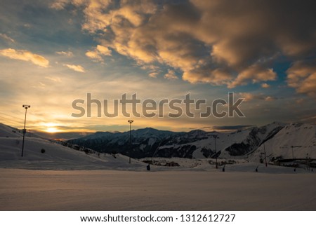 Snow area for ski in winter season sunset time 