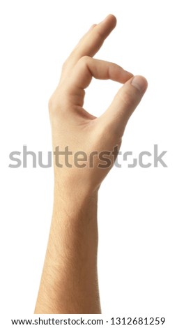 Male hand showing OK gesture on white background
